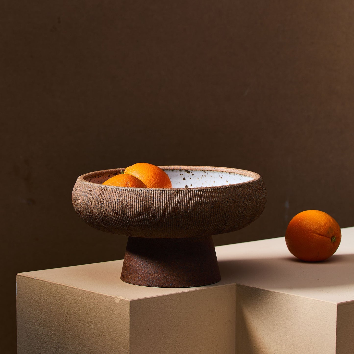 Handmade Ribbed Pedestal Bowl by SOMBRA